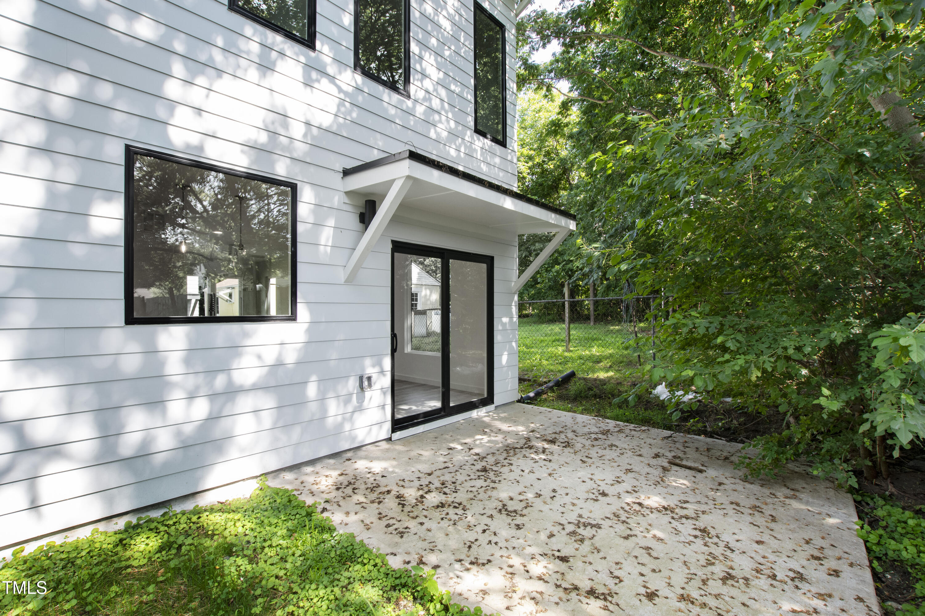 421 Eugene Street, Unit A Durham, NC 27701 - Photo 5 of 38 a view of a house with a garden