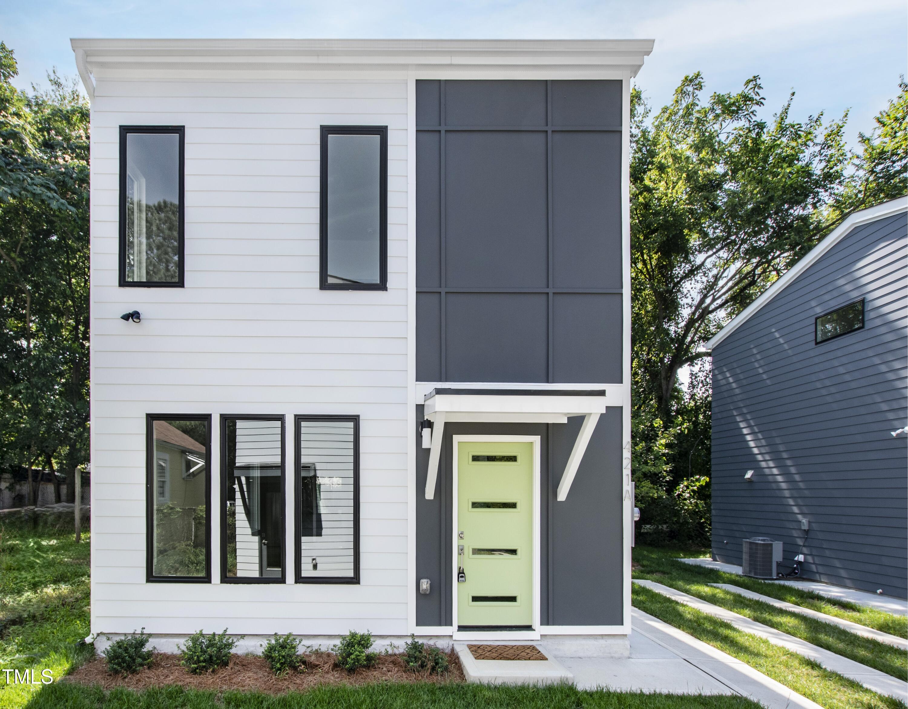 421 Eugene Street, Unit A Durham, NC 27701 - Photo 7 of 38 front view of a house with a yard