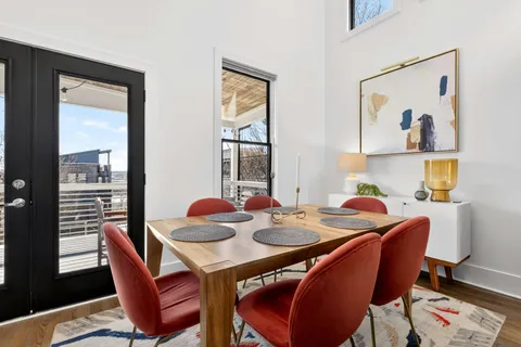 a view of a patio with wooden floor