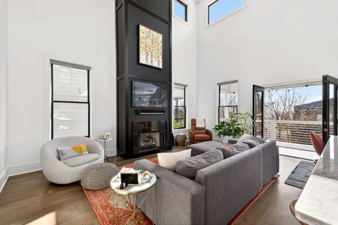 a bedroom with a bed and a chair