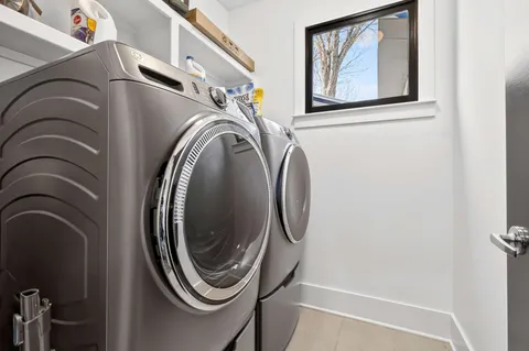 a view of a house with a iron gate
