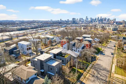 a view of balcony with wooden floor and seating space