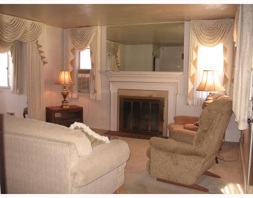 1121 Holmes Street McKees Rocks, PA 15136 - Photo 2 of 9 Living Room. Living Room with Fireplace