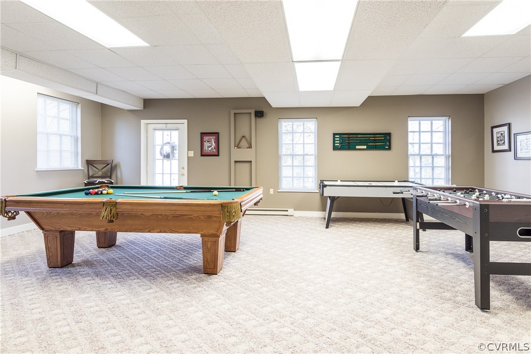 5201 Clipper Cove Road Midlothian, VA 23112 - Photo 35 of 49 a living room with furniture a pool table and a large window