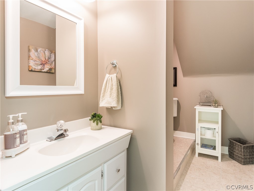 5201 Clipper Cove Road Midlothian, VA 23112 - Photo 38 of 49 a bathroom with a sink and a mirror