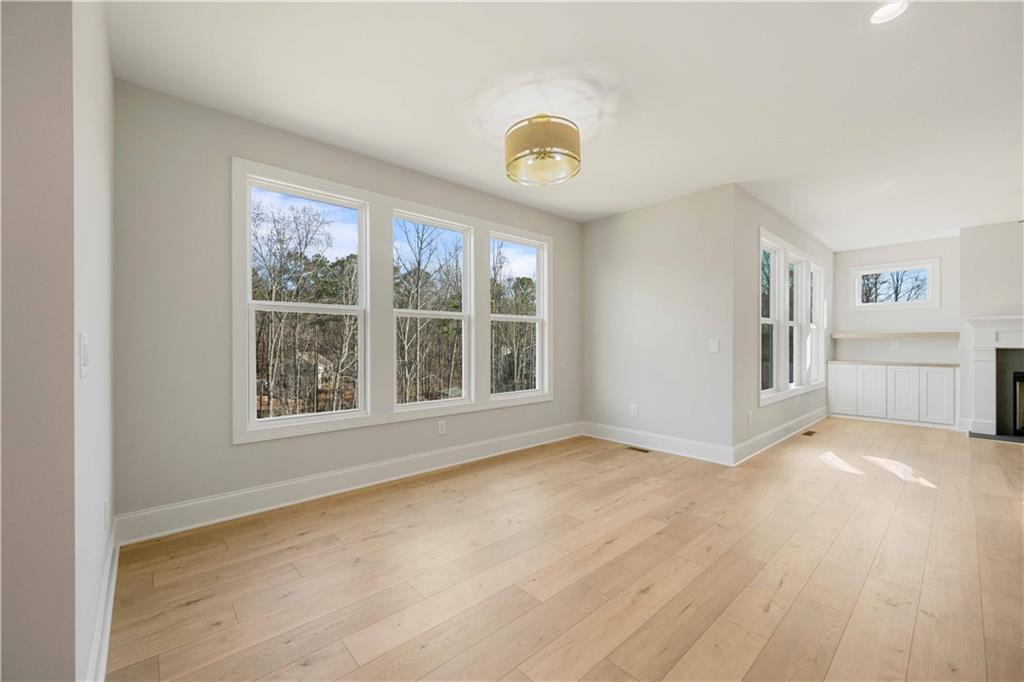 126 Spaulding Lane Woodstock, GA 30188 - Photo 17 of 48 a view of an empty room with a window