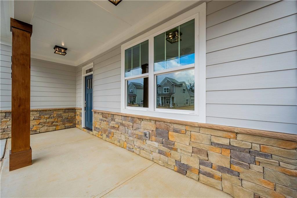 126 Spaulding Lane Woodstock, GA 30188 - Photo 4 of 48 a view of house with window