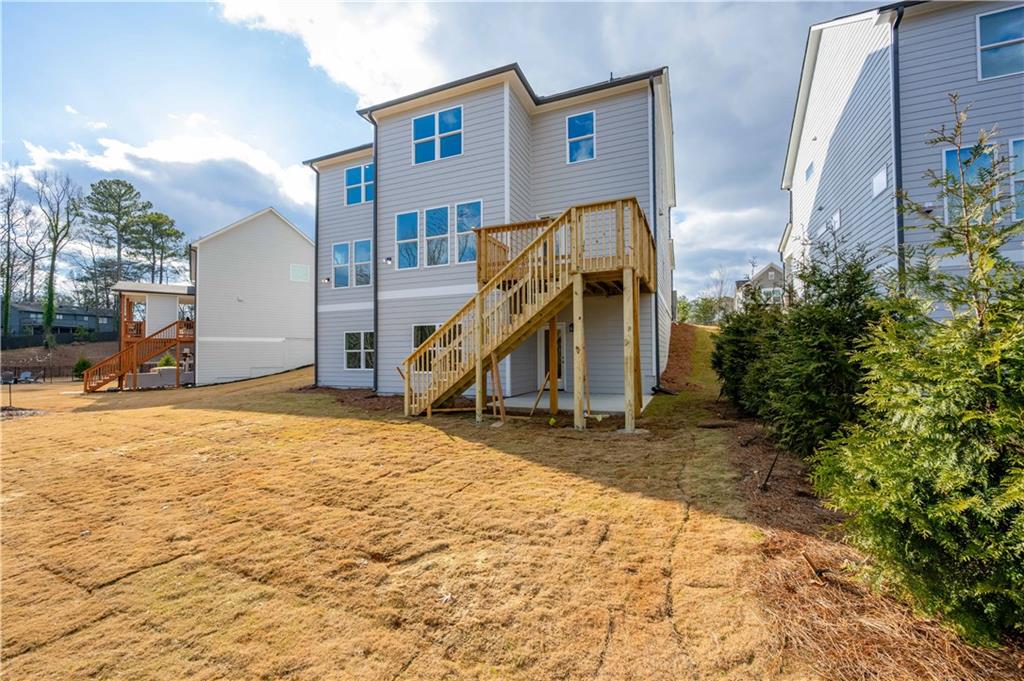 126 Spaulding Lane Woodstock, GA 30188 - Photo 44 of 48 a view of outdoor space yard and deck