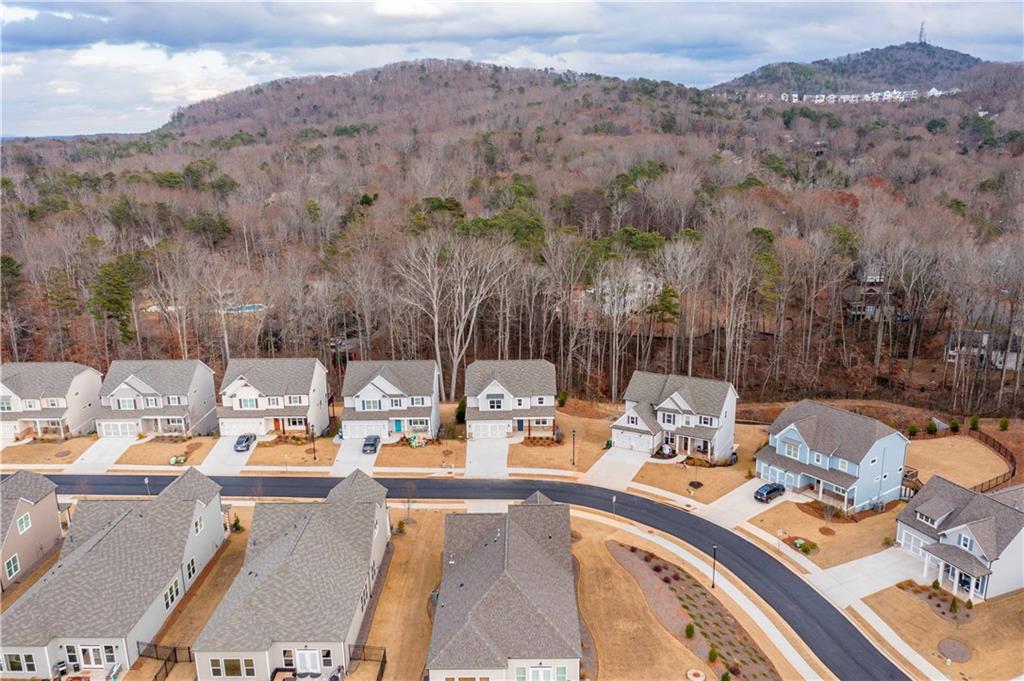 126 Spaulding Lane Woodstock, GA 30188 - Photo 47 of 48 a view of a terrace with sitting area