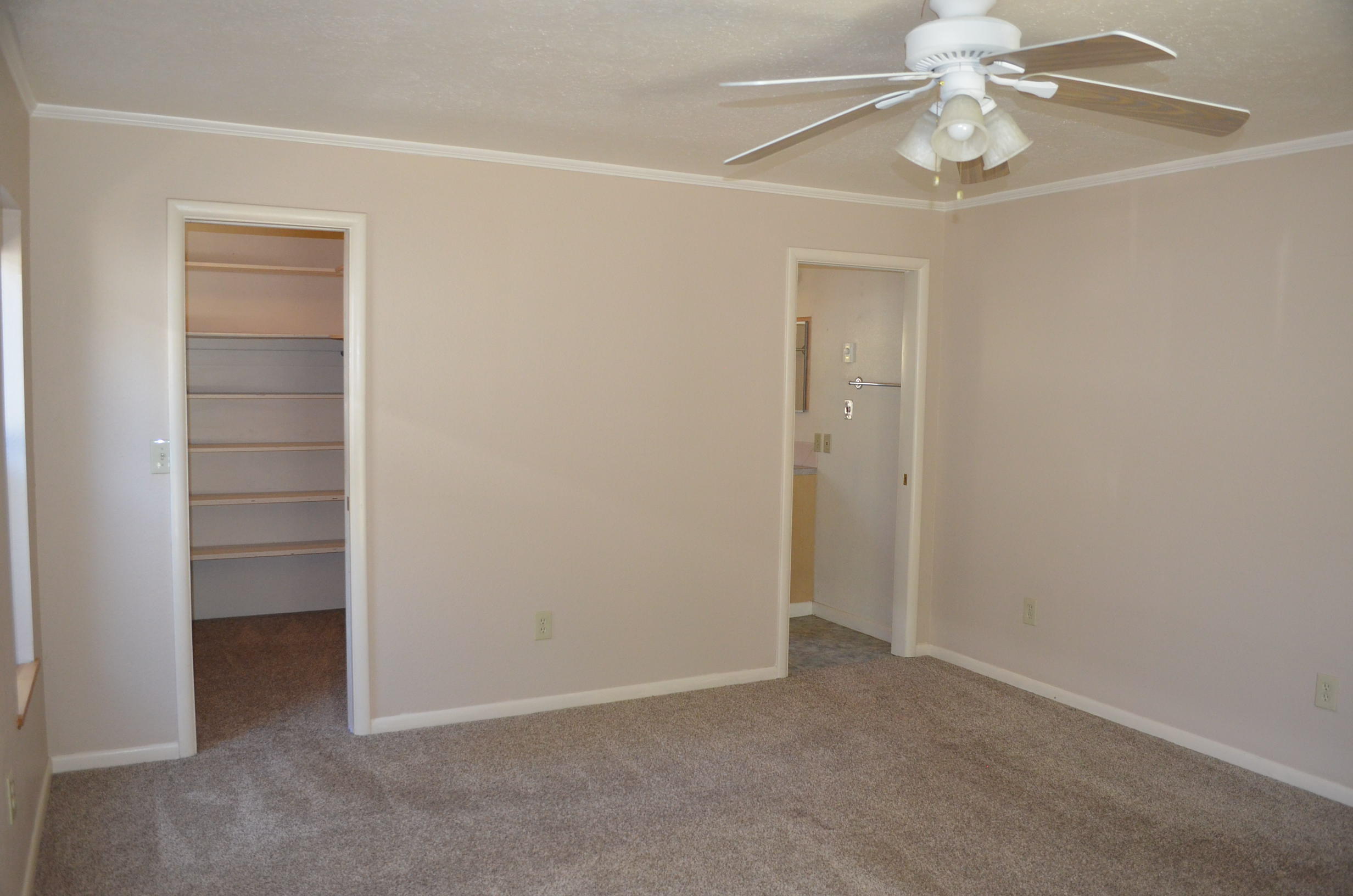 137008 Main Street Crescent, OR 97733 - Photo 31 of 50 an empty room with closet and fan