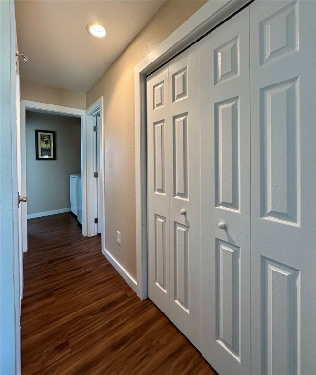 230 Cut-Off Road, Unit B107 Port Aransas, TX 78373 - Photo 12 of 25 a view of a hallway with wooden floor and staircase