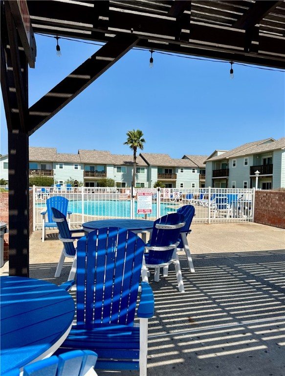 230 Cut-Off Road, Unit B107 Port Aransas, TX 78373 - Photo 25 of 25 a view of outdoor space with seating