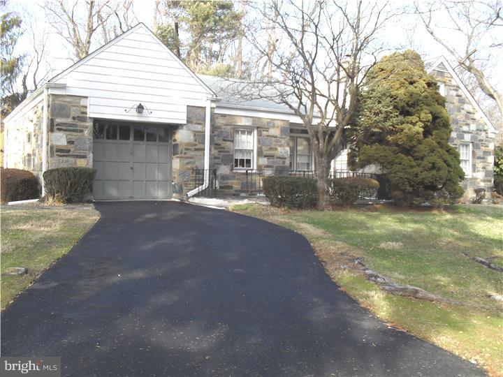 22 Beryl Road Cheltenham, PA 19012 - Photo 1 of 14 a view of a house with a yard and garage