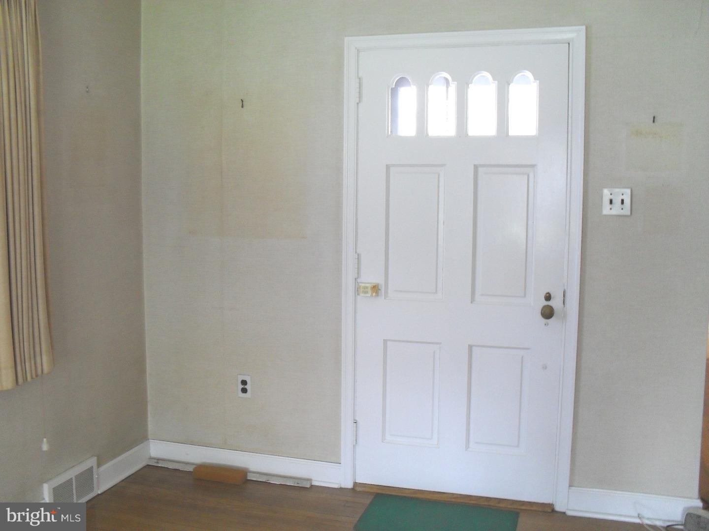 22 Beryl Road Cheltenham, PA 19012 - Photo 11 of 14 a view of front door with chandelier