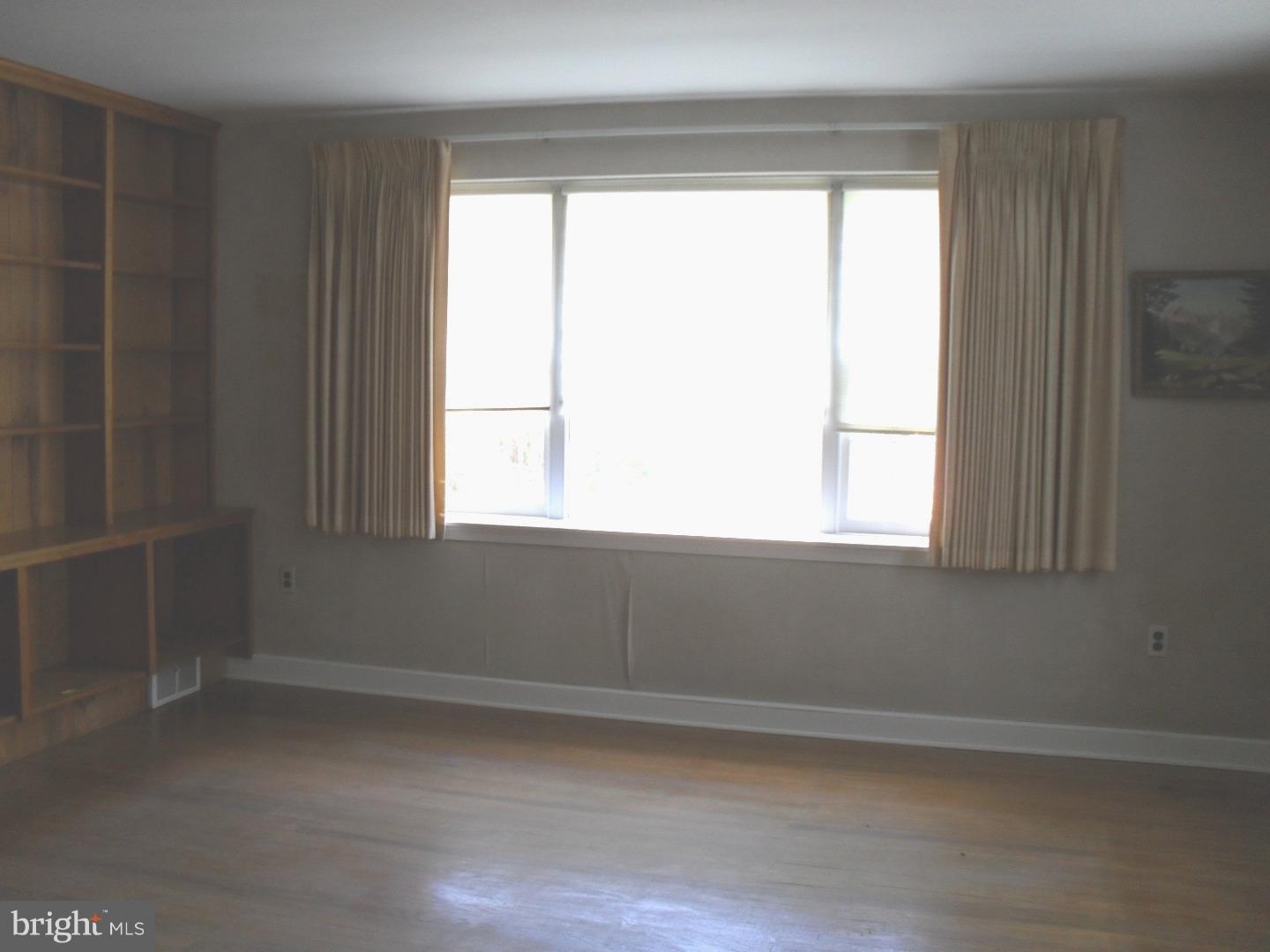 22 Beryl Road Cheltenham, PA 19012 - Photo 10 of 14 a view of an empty room with a window