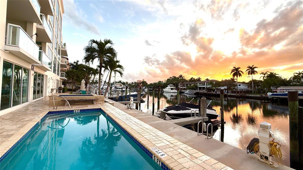 45 Hendricks Isle, Unit 403 Fort Lauderdale, FL 33301 - Photo 24 of 26 a view of a lake with couches and city view