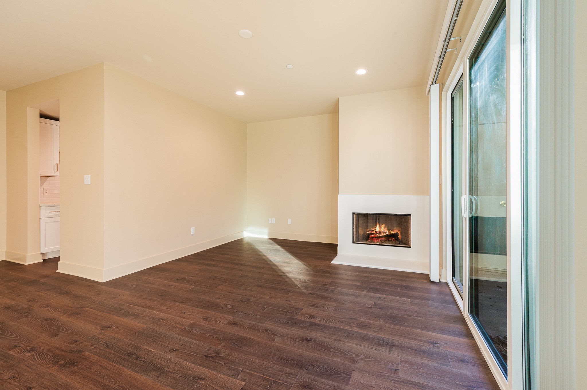 2829 Timmons Lane, Unit 201 Houston, TX 77027 - Photo 12 of 42 a view of a hallway with a fireplace