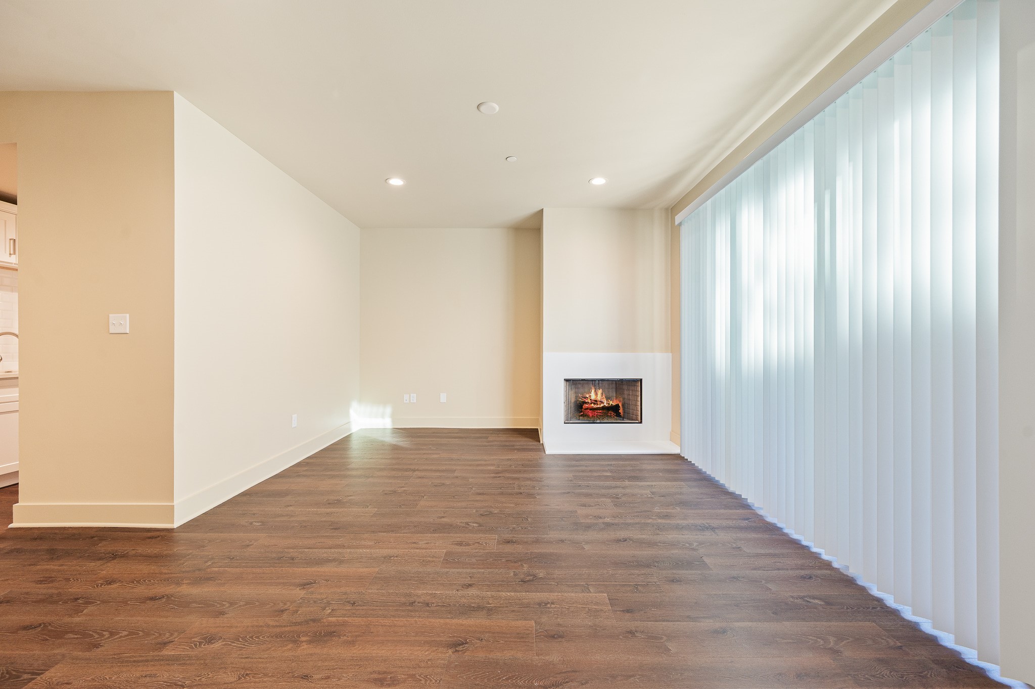 2829 Timmons Lane, Unit 201 Houston, TX 77027 - Photo 13 of 42 a view of an empty room with wooden floor and a window