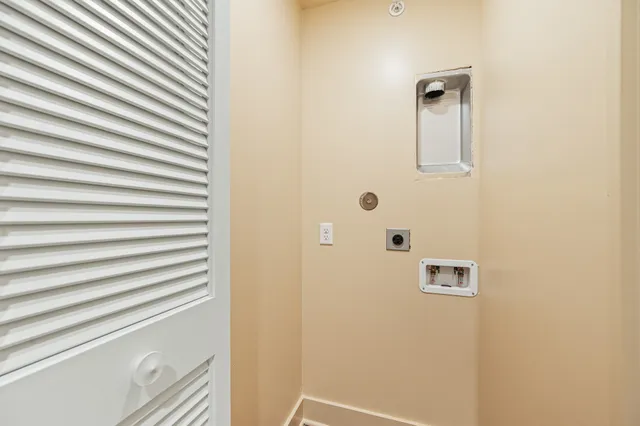 a bathroom with a shower and a sink