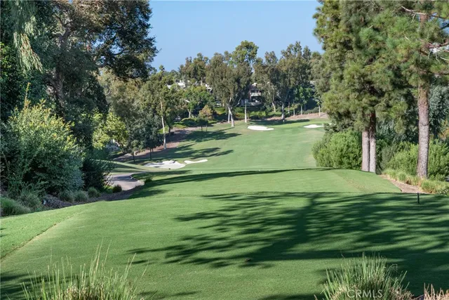 a view of a golf course with a yard