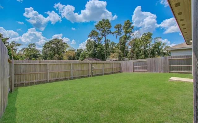 a view of a backyard with a garden