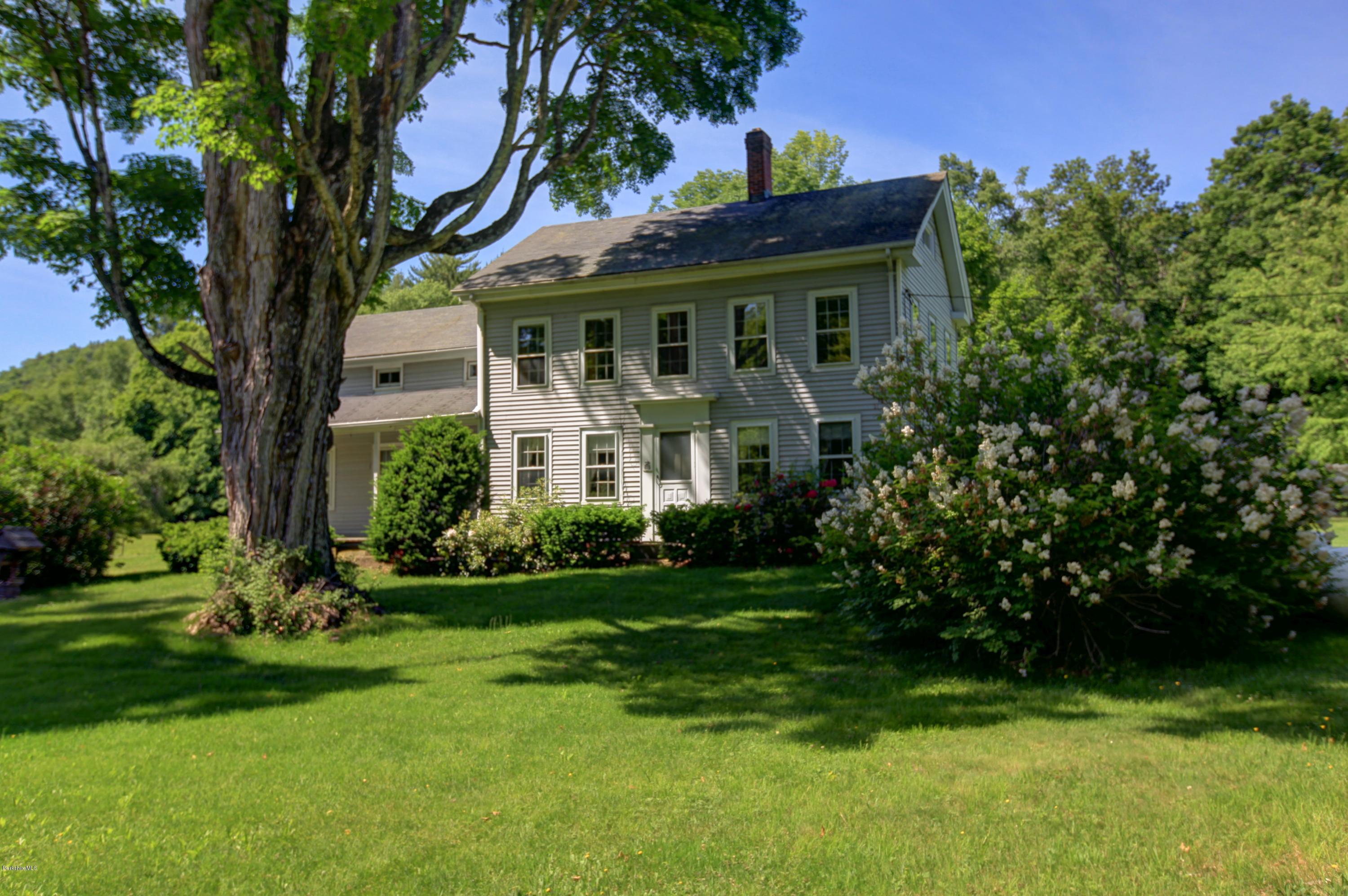 47 Sandisfield Road Sandisfield, MA 01255 - Photo 1 of 25 a front view of a house with a yard