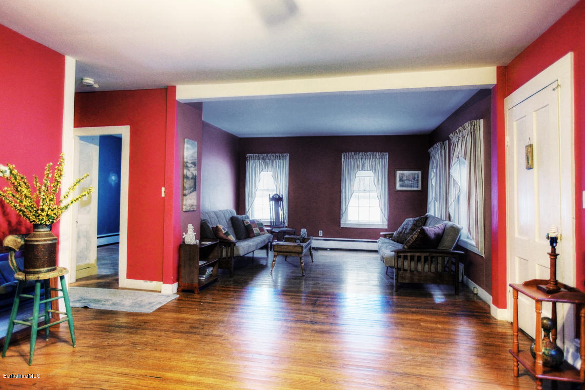 47 Sandisfield Road Sandisfield, MA 01255 - Photo 14 of 25 a living room with furniture window and wooden floor