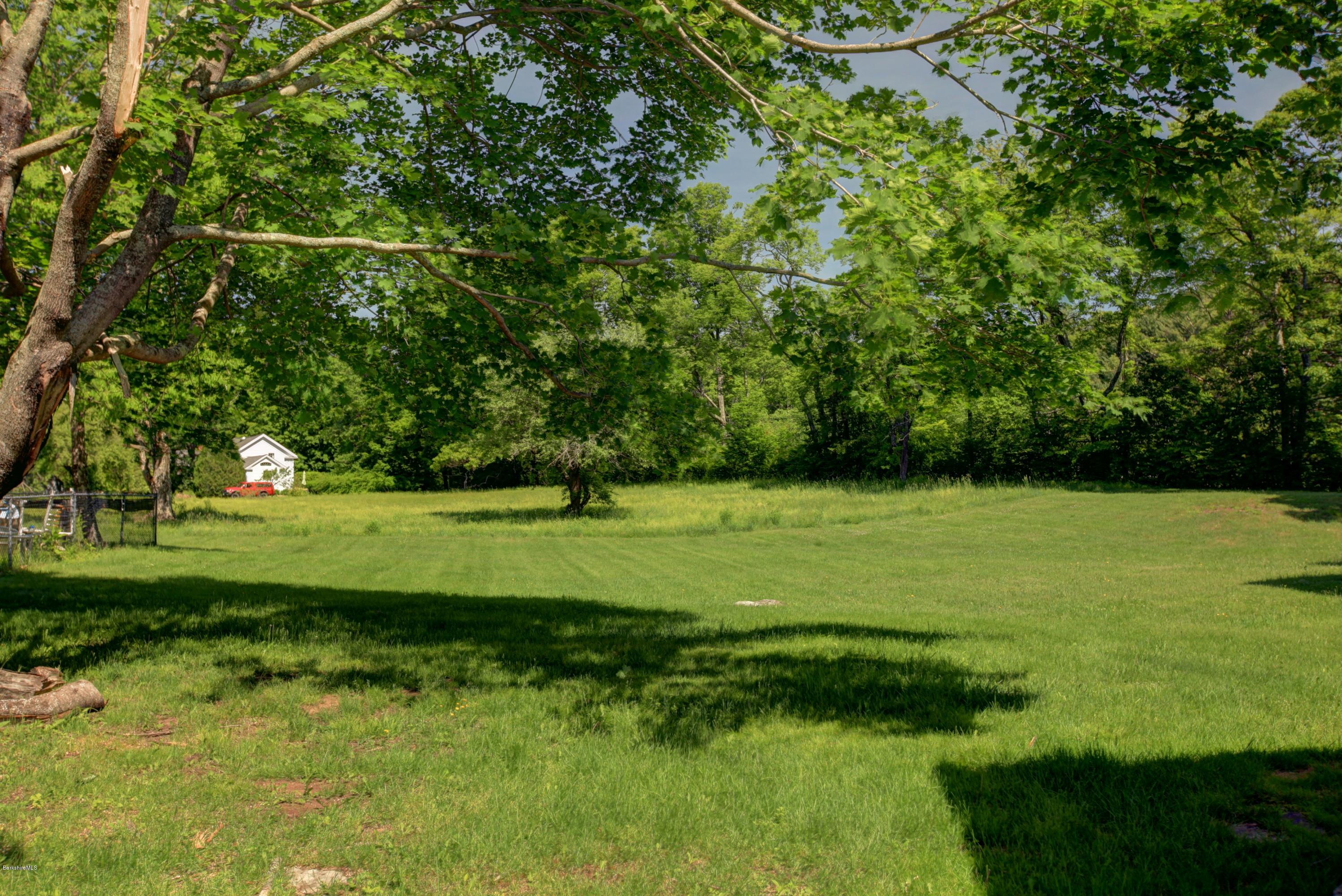 47 Sandisfield Road Sandisfield, MA 01255 - Photo 5 of 25 a view of a field with a tree