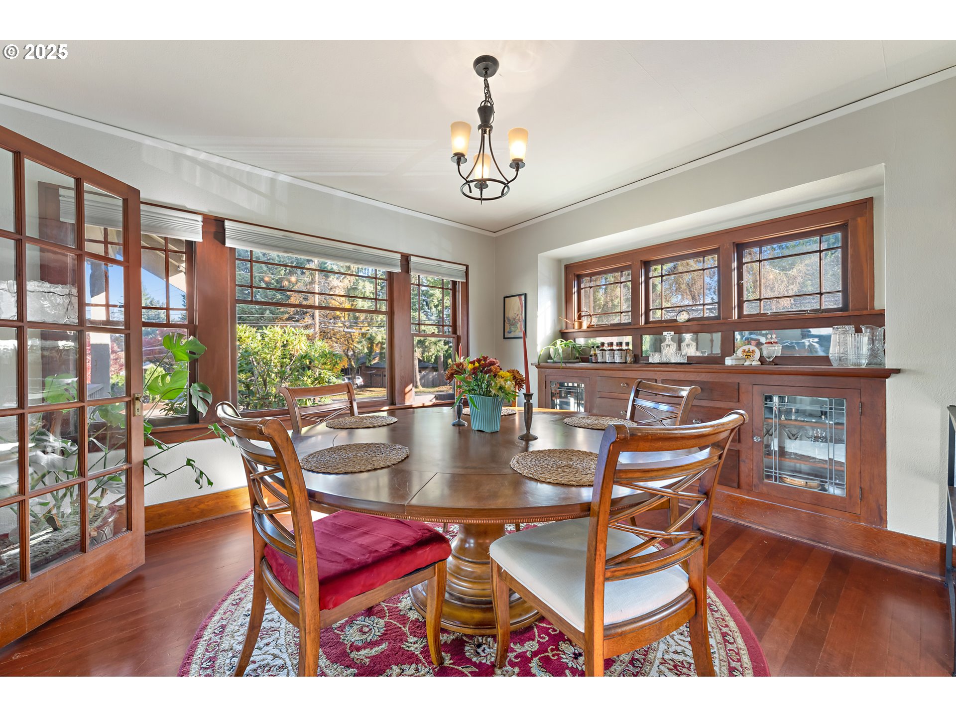 9670 Southwest Frewing Street Portland, OR 97223 - Photo 11 of 40 a view of a dining room with furniture window and wooden floor