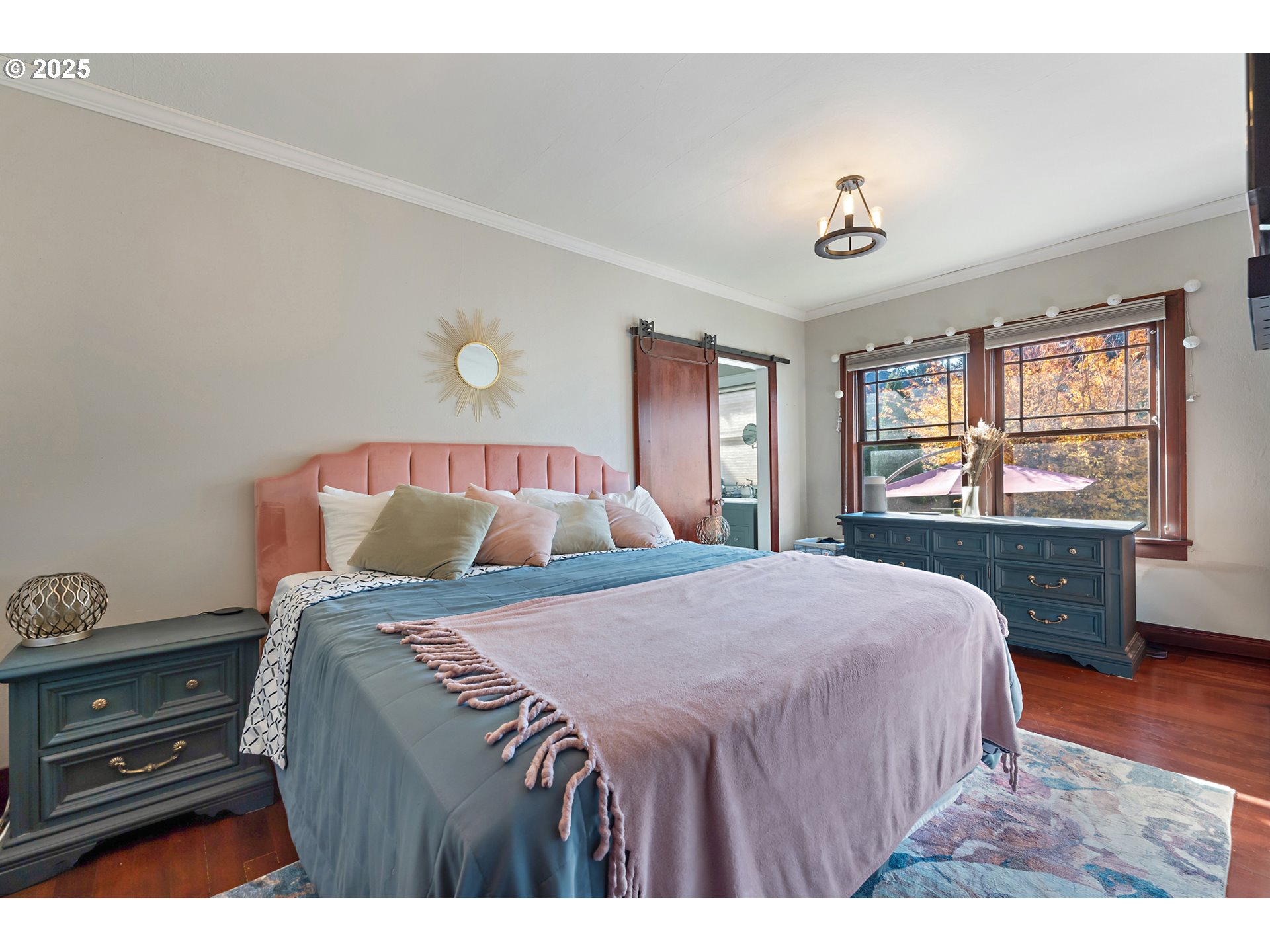 9670 Southwest Frewing Street Portland, OR 97223 - Photo 17 of 40 a bedroom with a bed and a window