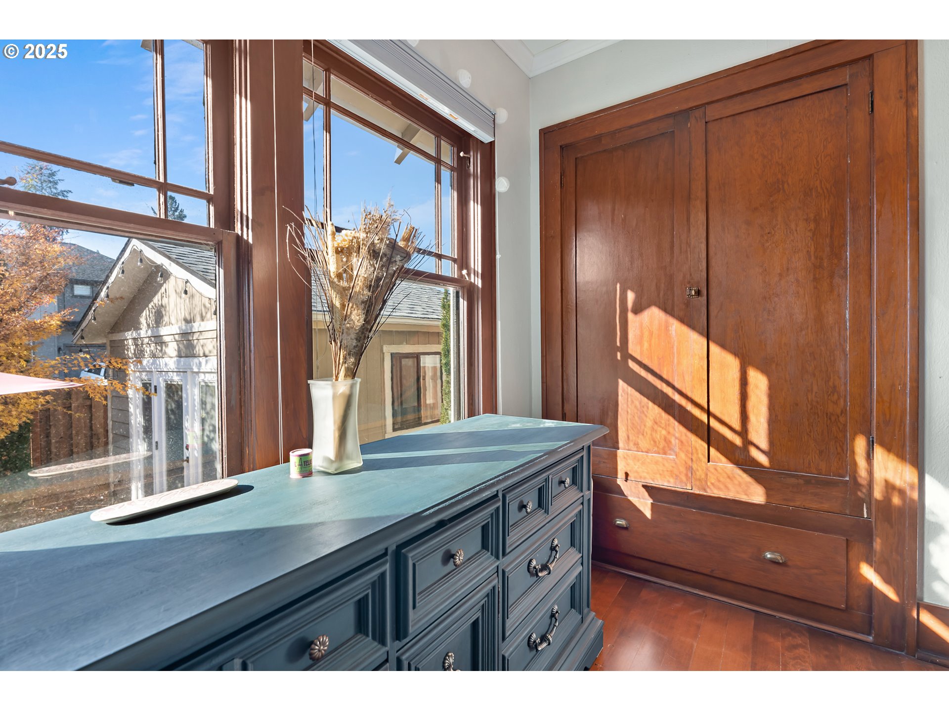 9670 Southwest Frewing Street Portland, OR 97223 - Photo 18 of 40 a bathroom with a sink a mirror and next to a window