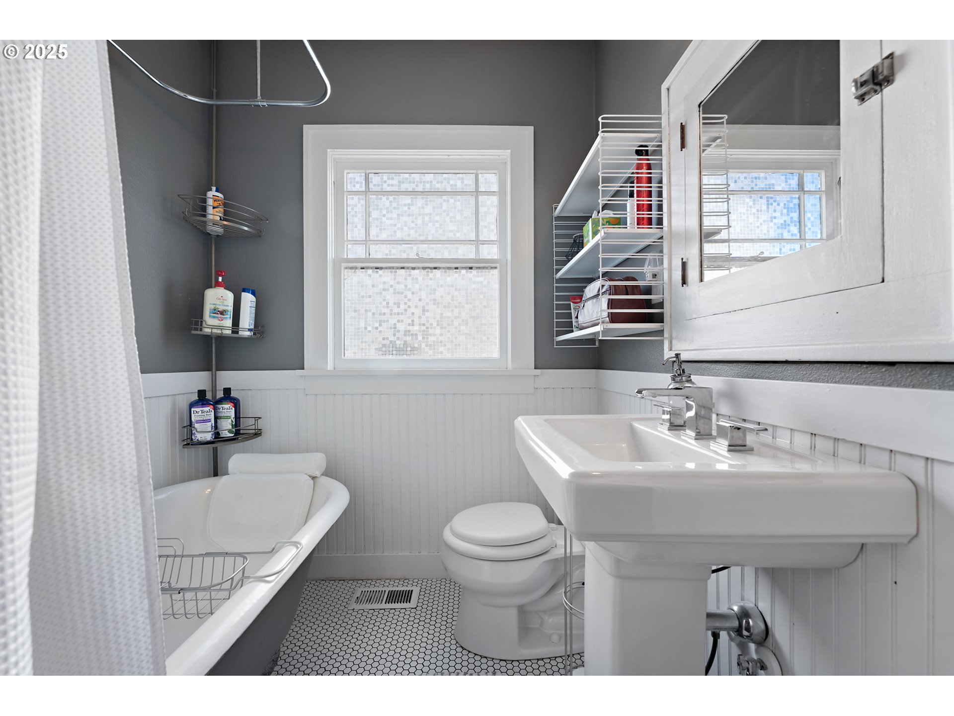 9670 Southwest Frewing Street Portland, OR 97223 - Photo 21 of 40 a bathroom with a sink toilet and a mirror