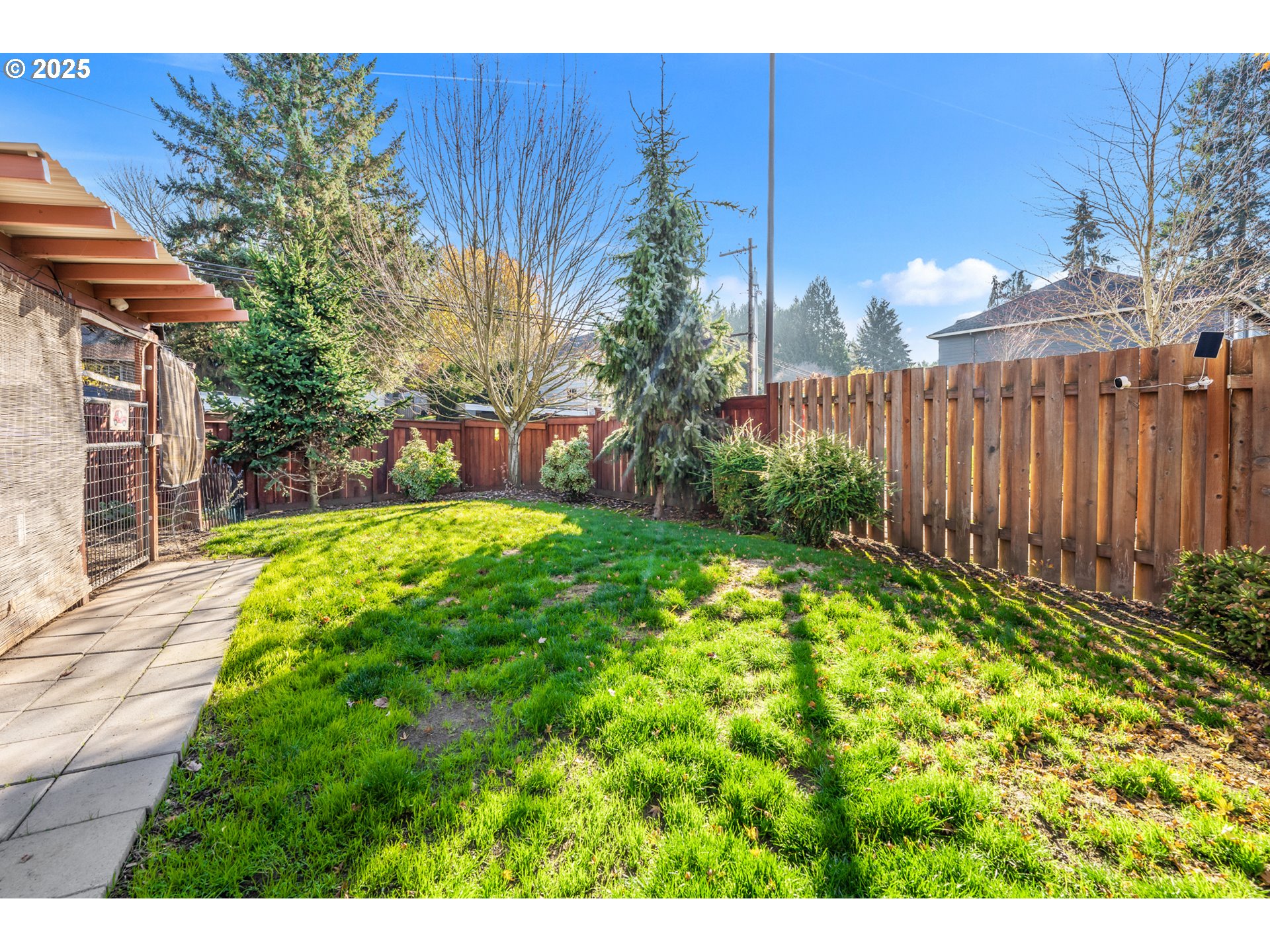 9670 Southwest Frewing Street Portland, OR 97223 - Photo 34 of 40 a view of a backyard with a garden