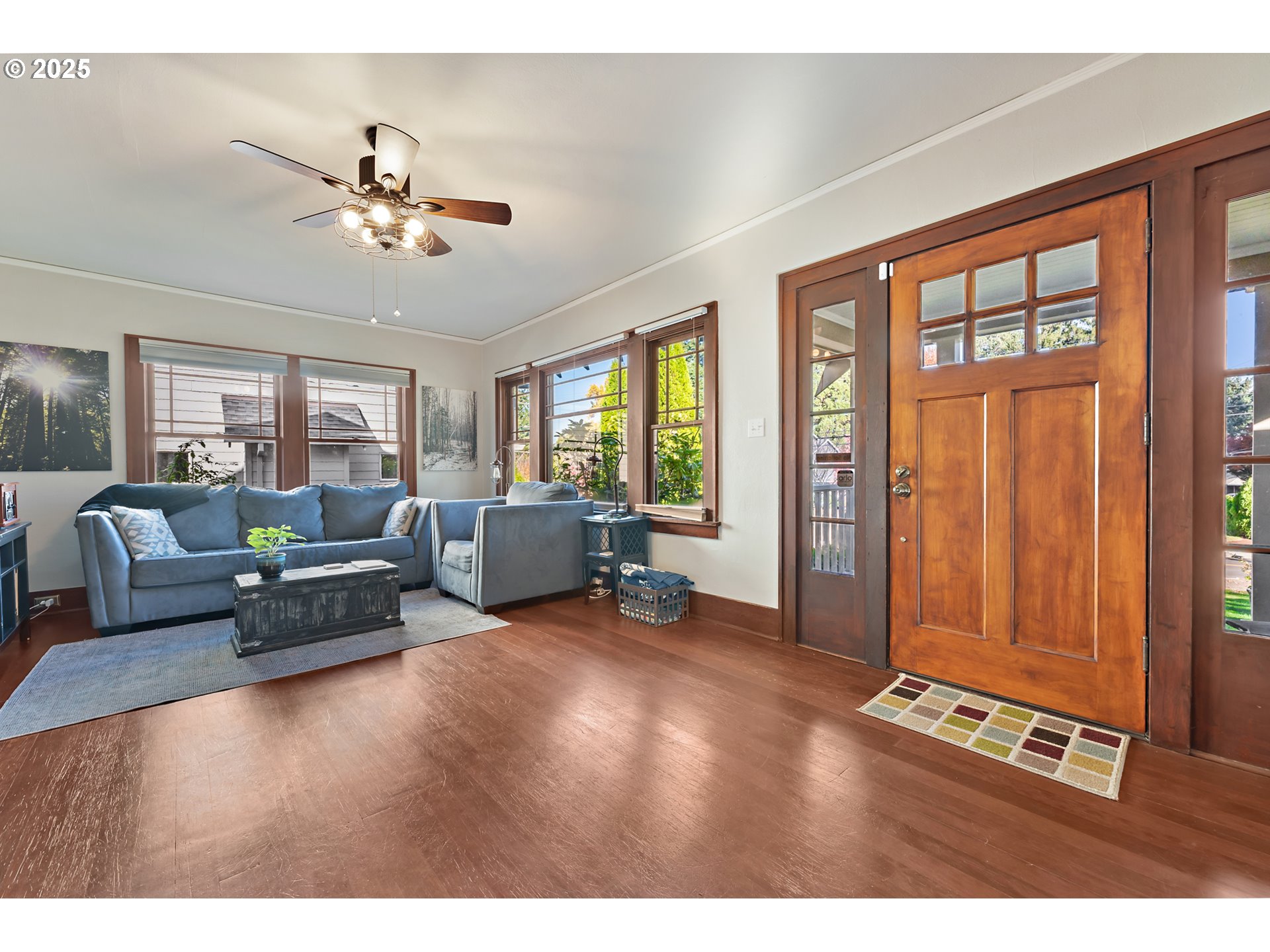 9670 Southwest Frewing Street Portland, OR 97223 - Photo 5 of 40 a living room with furniture and large windows