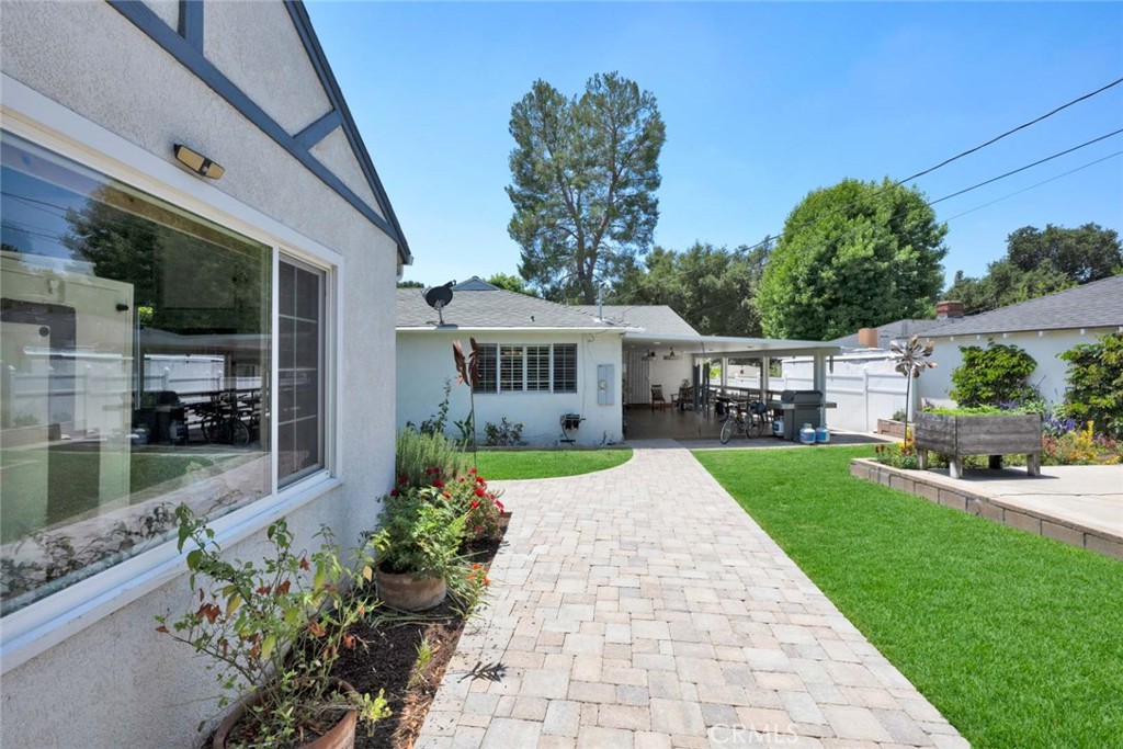 5456 Cadbury Road Whittier, CA 90601 - Photo 36 of 67 a front view of a house with garden
