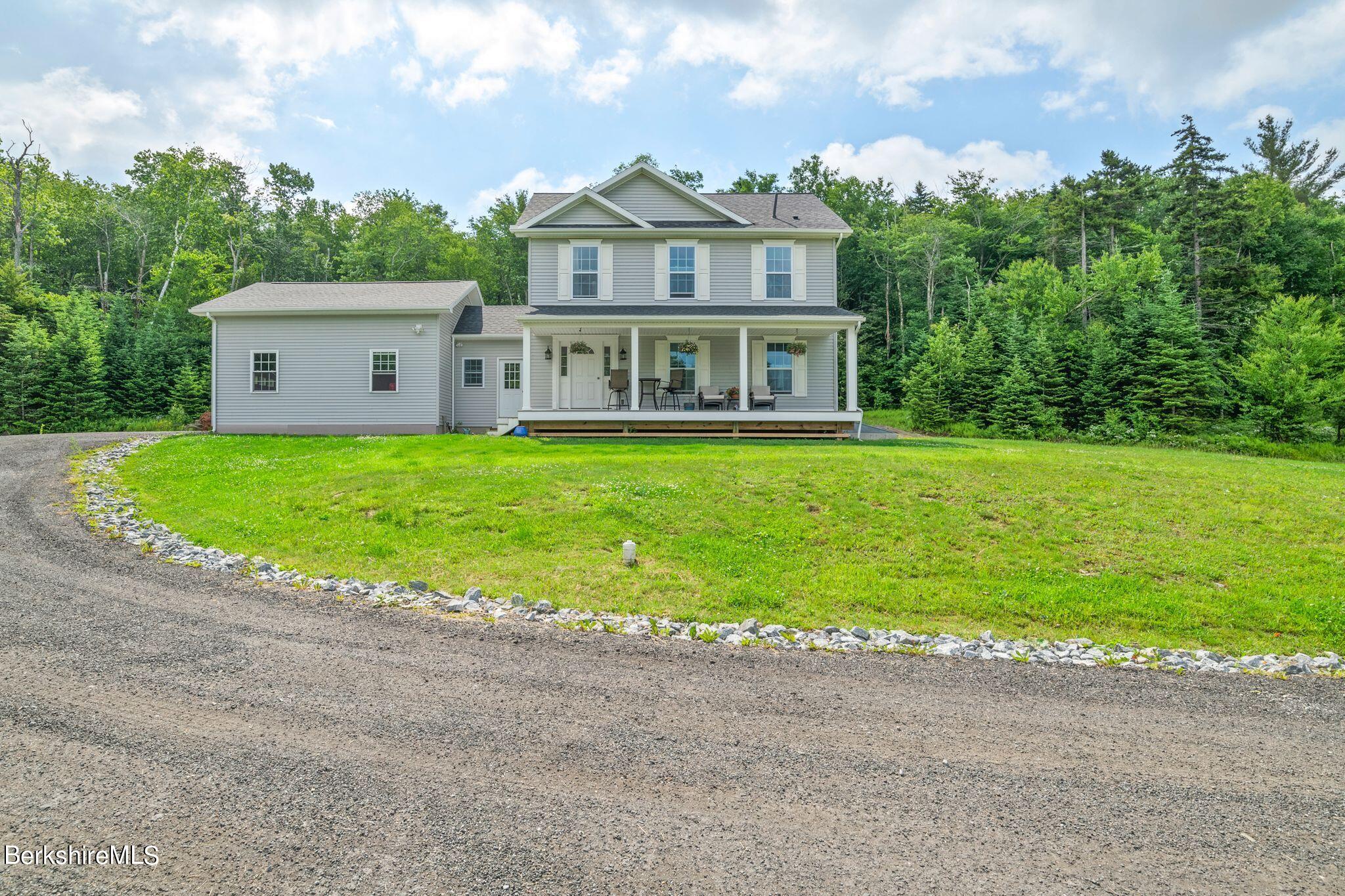 14 East Windsor Road Peru, MA 01235 - Photo 2 of 41 a view of a house with a backyard