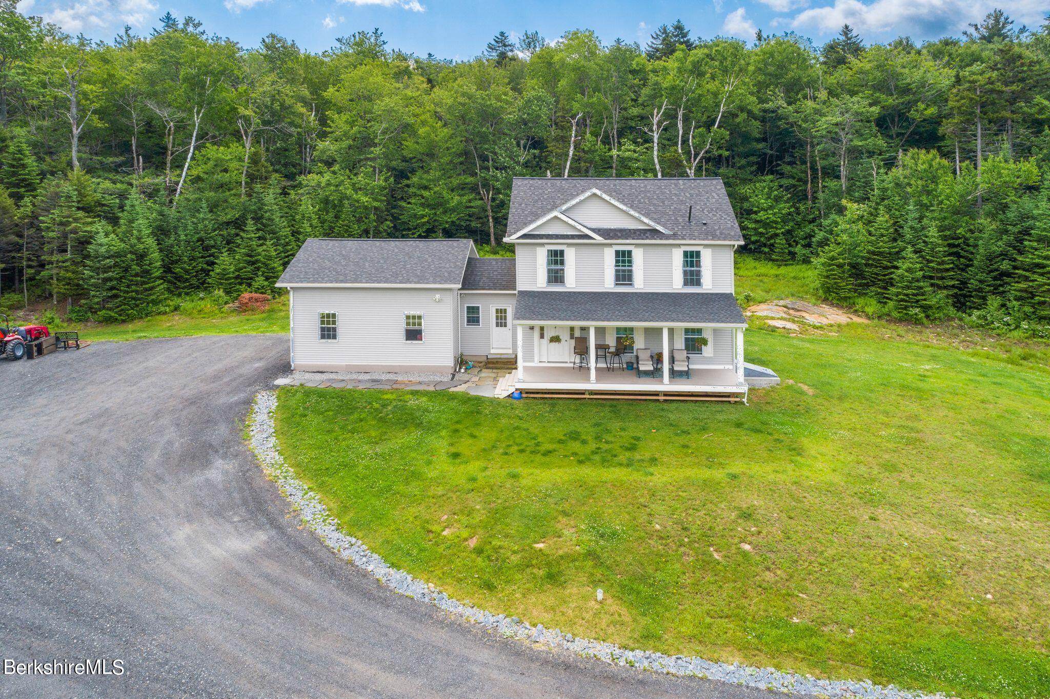 14 East Windsor Road Peru, MA 01235 - Photo 3 of 41 an aerial view of a house with swimming pool garden view and trees