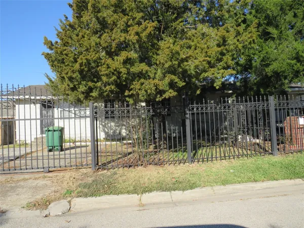 a view of a backyard with a garden