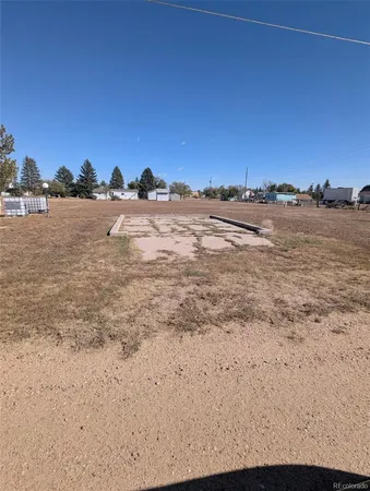 a view of a road with an ocean view
