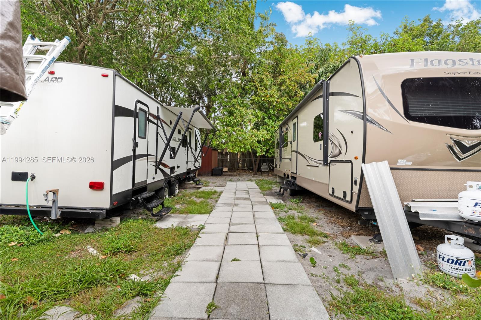 5635 Pierce Street Hollywood, FL 33021 - Photo 24 of 27 a view of a back yard of the house