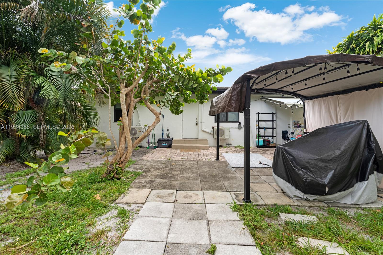 5635 Pierce Street Hollywood, FL 33021 - Photo 25 of 27 a view of backyard with sitting area
