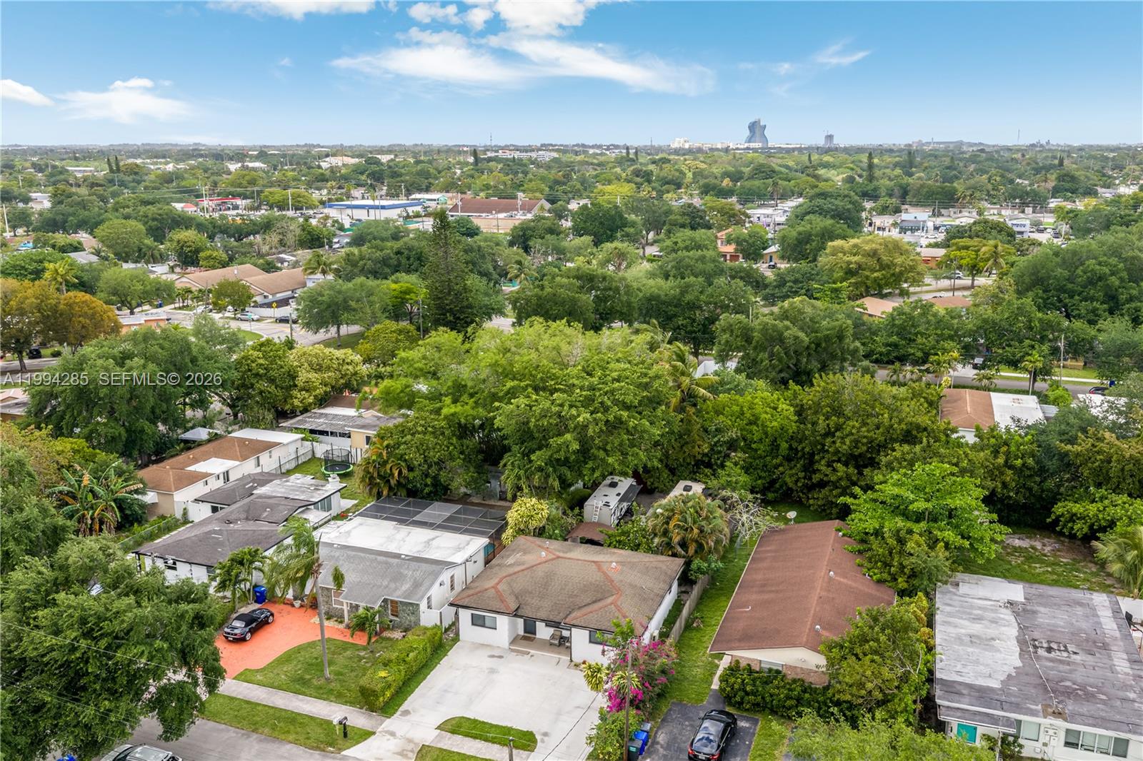 5635 Pierce Street Hollywood, FL 33021 - Photo 4 of 27 an aerial view of residential houses with outdoor space and trees