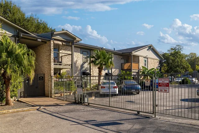 a view of a tables and chairs in a patio