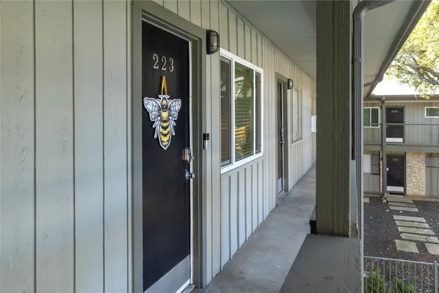 a view of a door and a porch with a porch