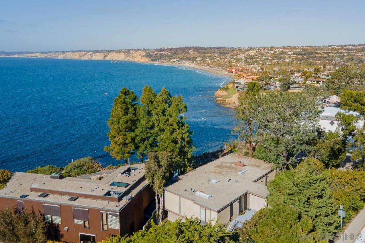 1595 Coast Walk La Jolla, CA 92037 - Photo 12 of 24 an aerial view of a house with a lake view