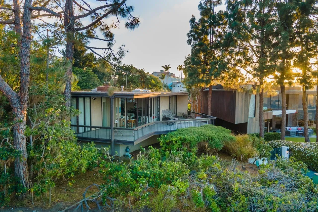 1595 Coast Walk La Jolla, CA 92037 - Photo 18 of 24 a view of house with backyard space and garden