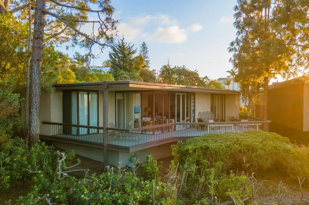 1595 Coast Walk La Jolla, CA 92037 - Photo 6 of 24 a house view with swimming pool in front of it