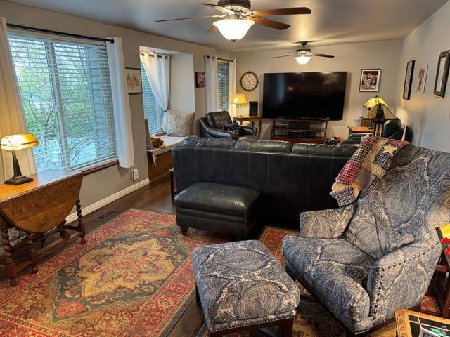 698 East 200 South Bountiful, UT 84010 - Photo 11 of 38 Living area with ceiling fan and wood finished floors