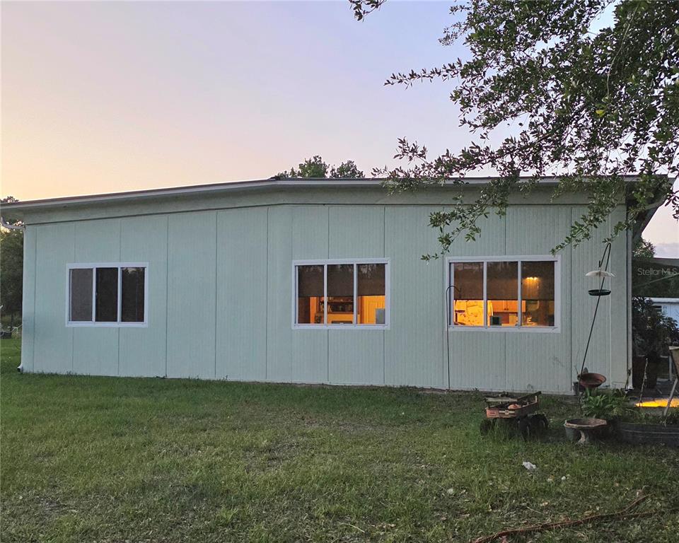 54523 Astor Transfer Station Road Astor, FL 32102 - Photo 2 of 31 a backyard of a house with lots of green space