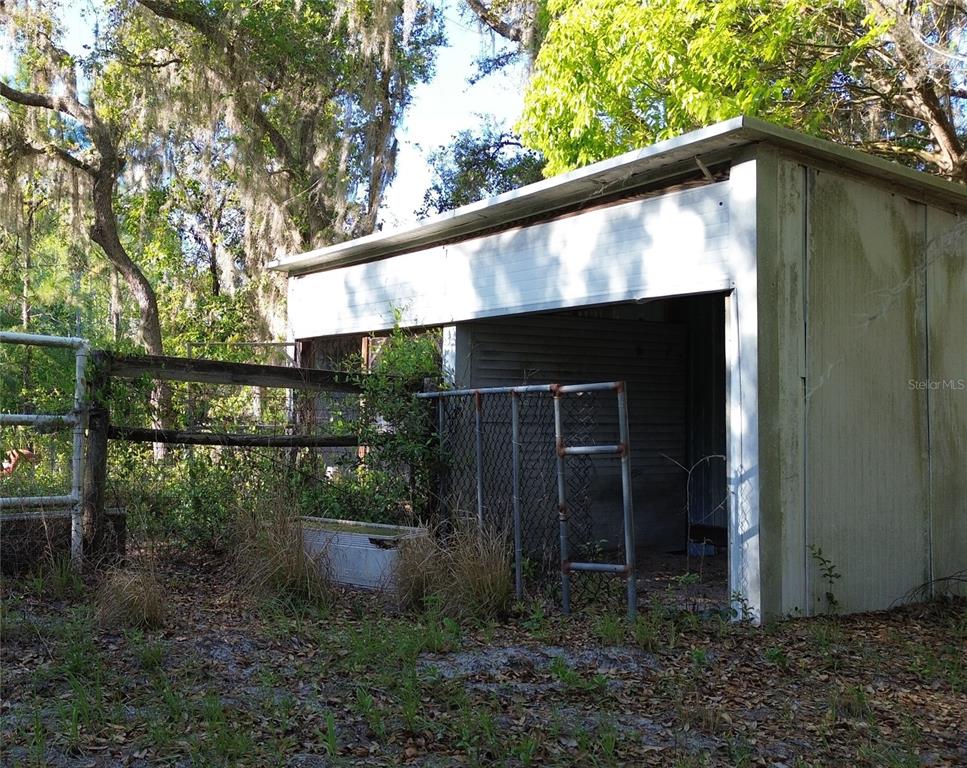 54523 Astor Transfer Station Road Astor, FL 32102 - Photo 22 of 31 a backyard of a house with lots of green space